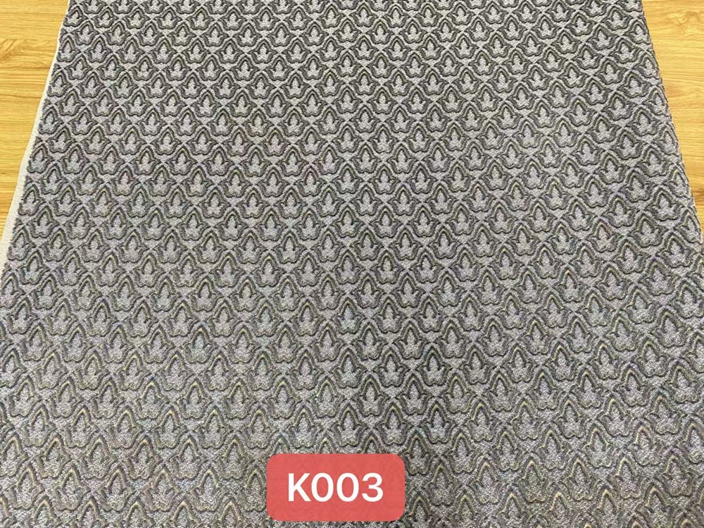 K003